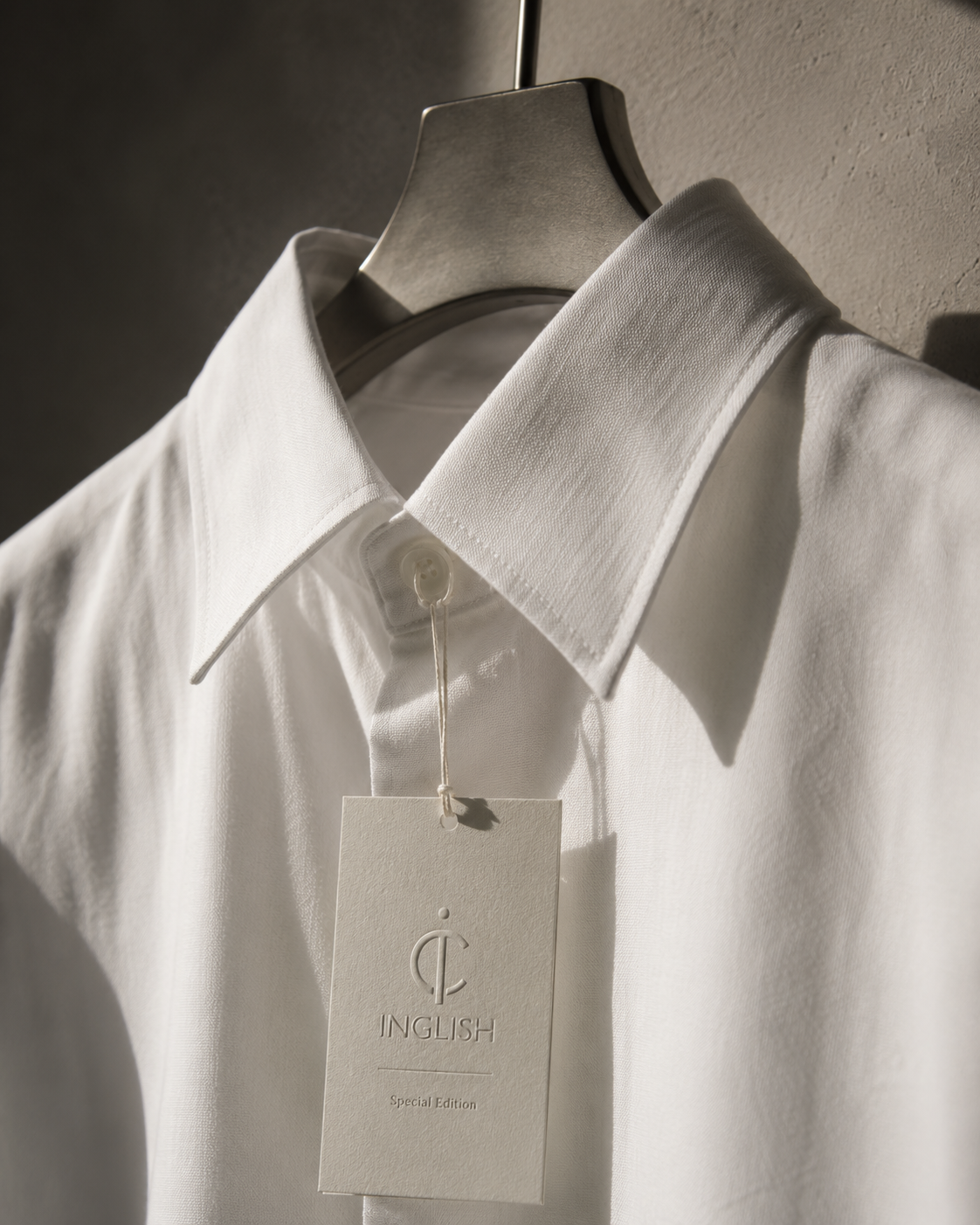 White cotton shirt with the Inglish Special Edition tag
